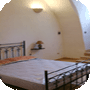 Camera da letto negli appartamenti in affitto a Minervino